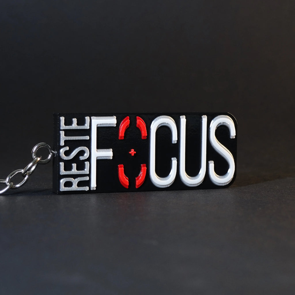 Porte-clés "RESTE FOCUS" Ethernity Shop