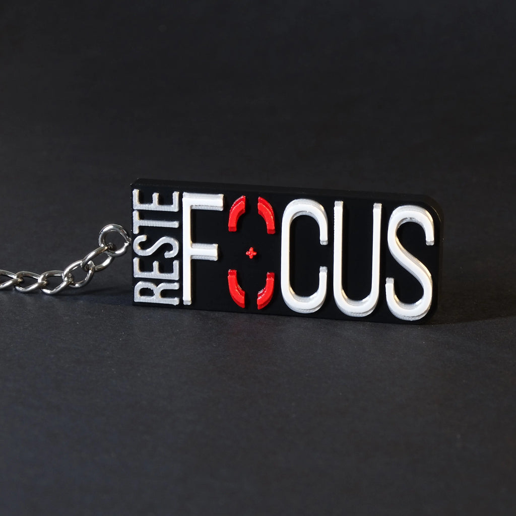 Porte-clés "RESTE FOCUS" Ethernity Shop