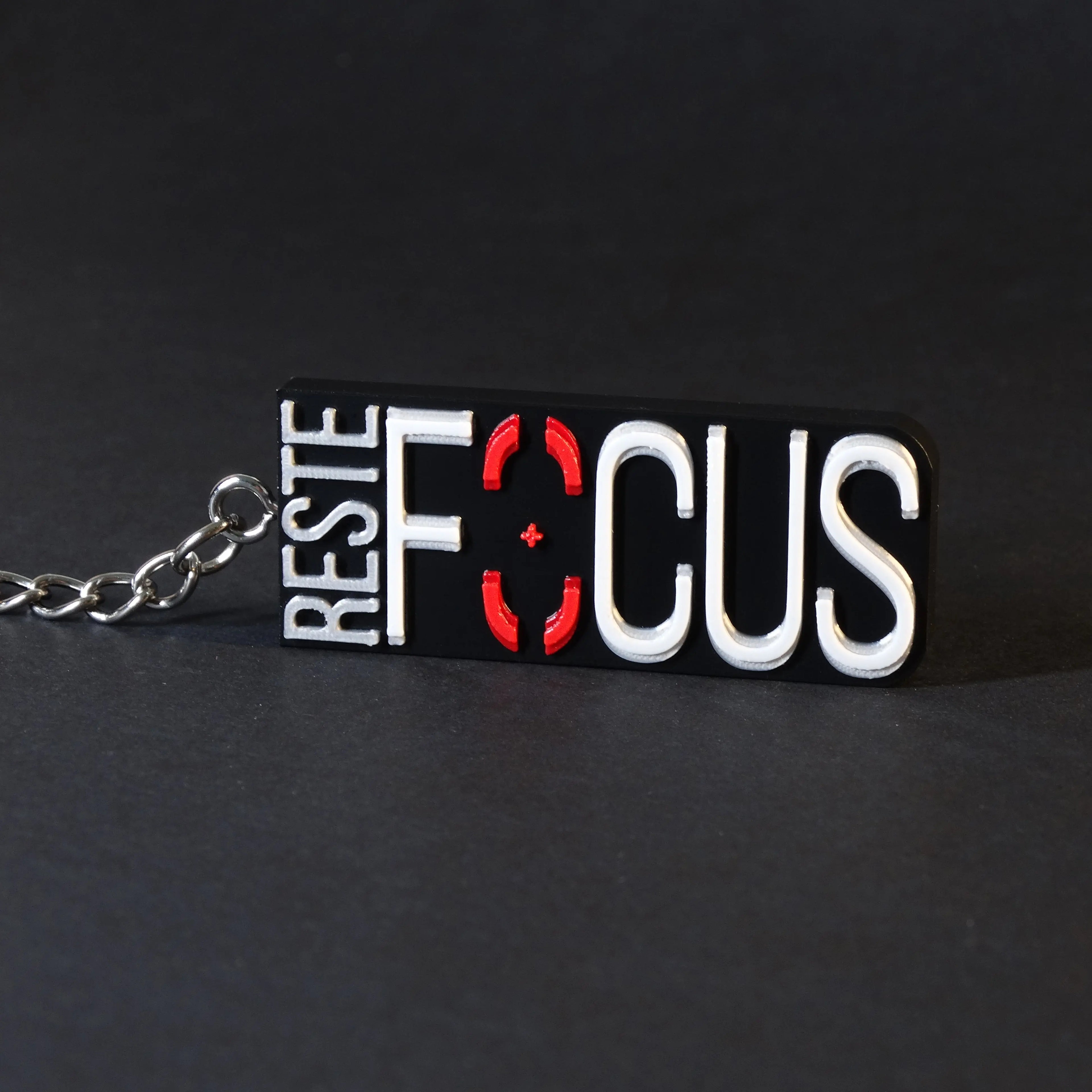 Porte-clés "RESTE FOCUS" Ethernity Shop